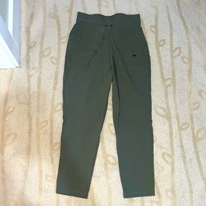army green Nike athletic pants